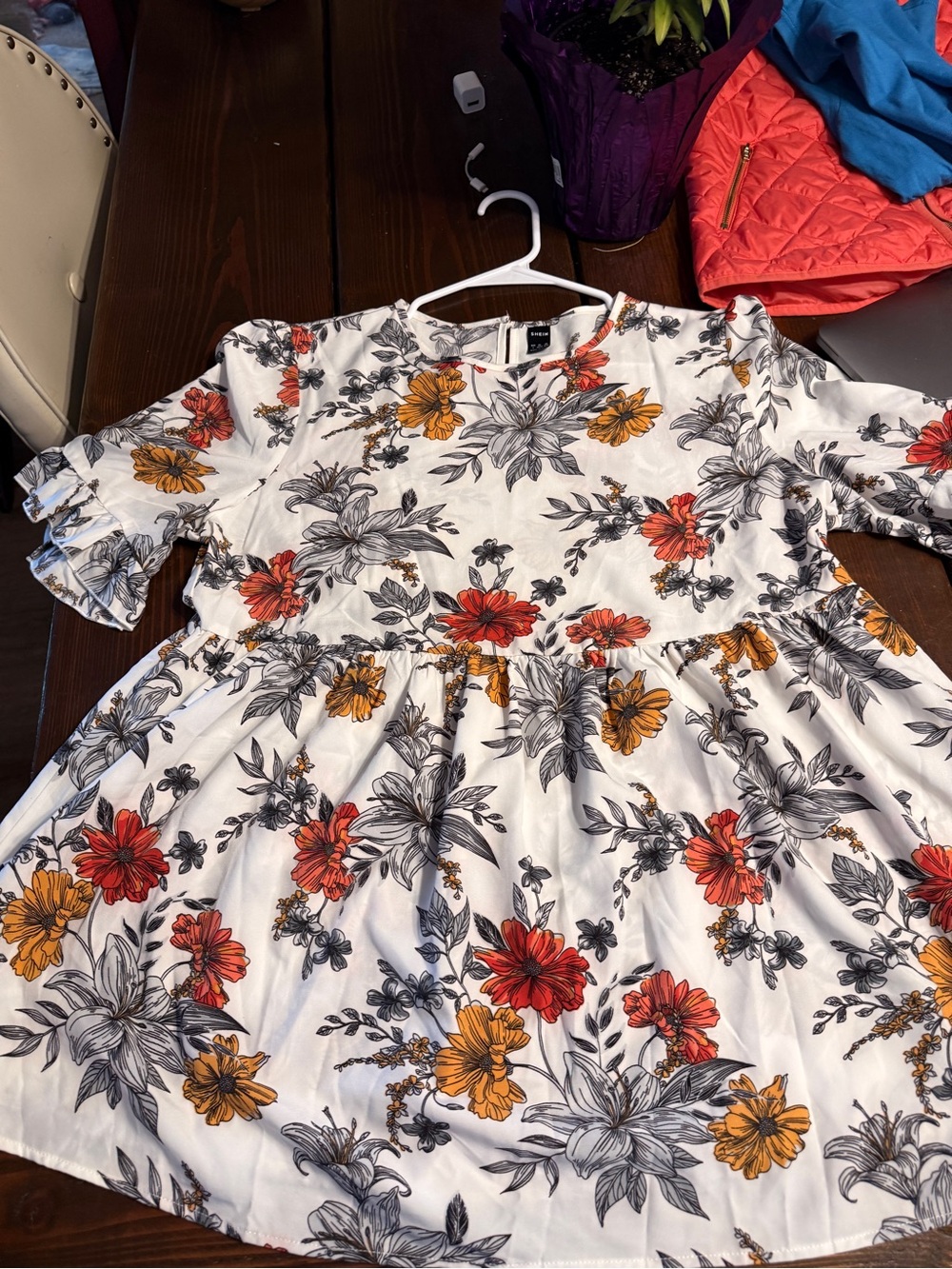 Woman’s Floral Peplum top- White with Red & Mustard Flowers - Picture 2 of 3